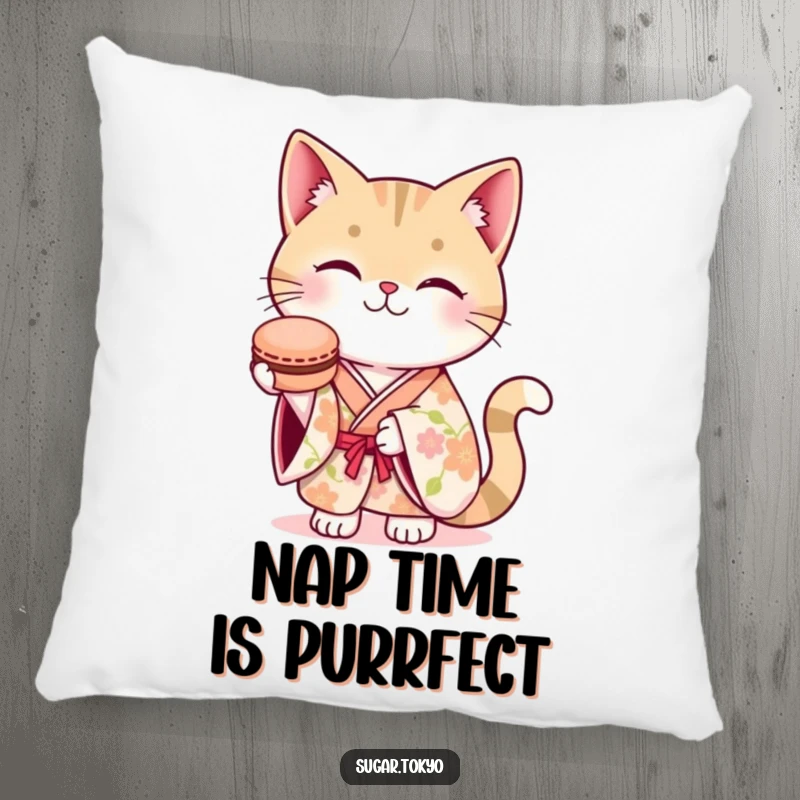 Funny pillow featuring a smiling cat in a floral kimono, offering a macaron, perfect for adding cozy humor to any room.