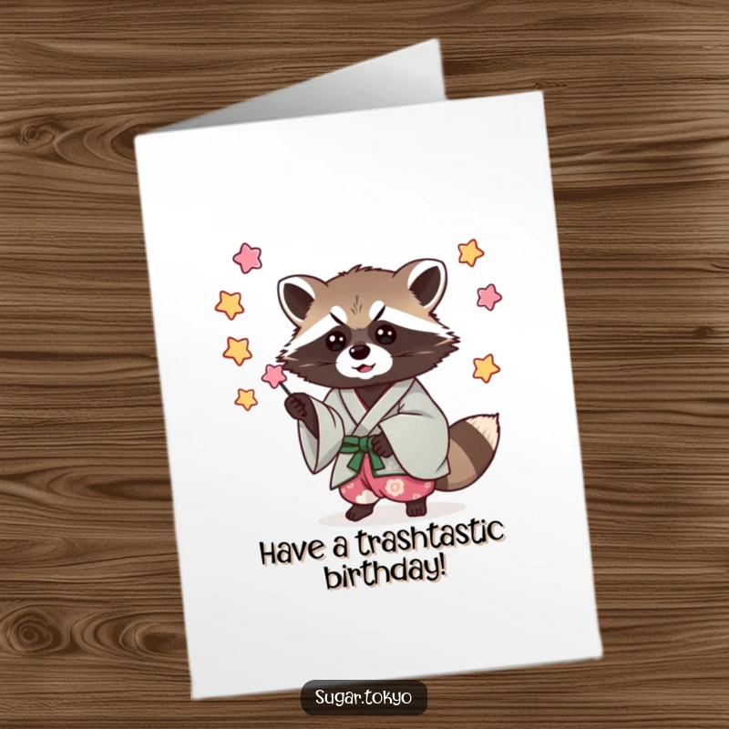 Funny Free Printable Birthday Card: A cool raccoon in a kimono playfully catches falling candy stars, celebrating a sweet birthday.